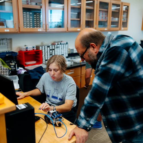 Professor working with a student